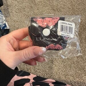 L'Oreal Pink and Black airpods case